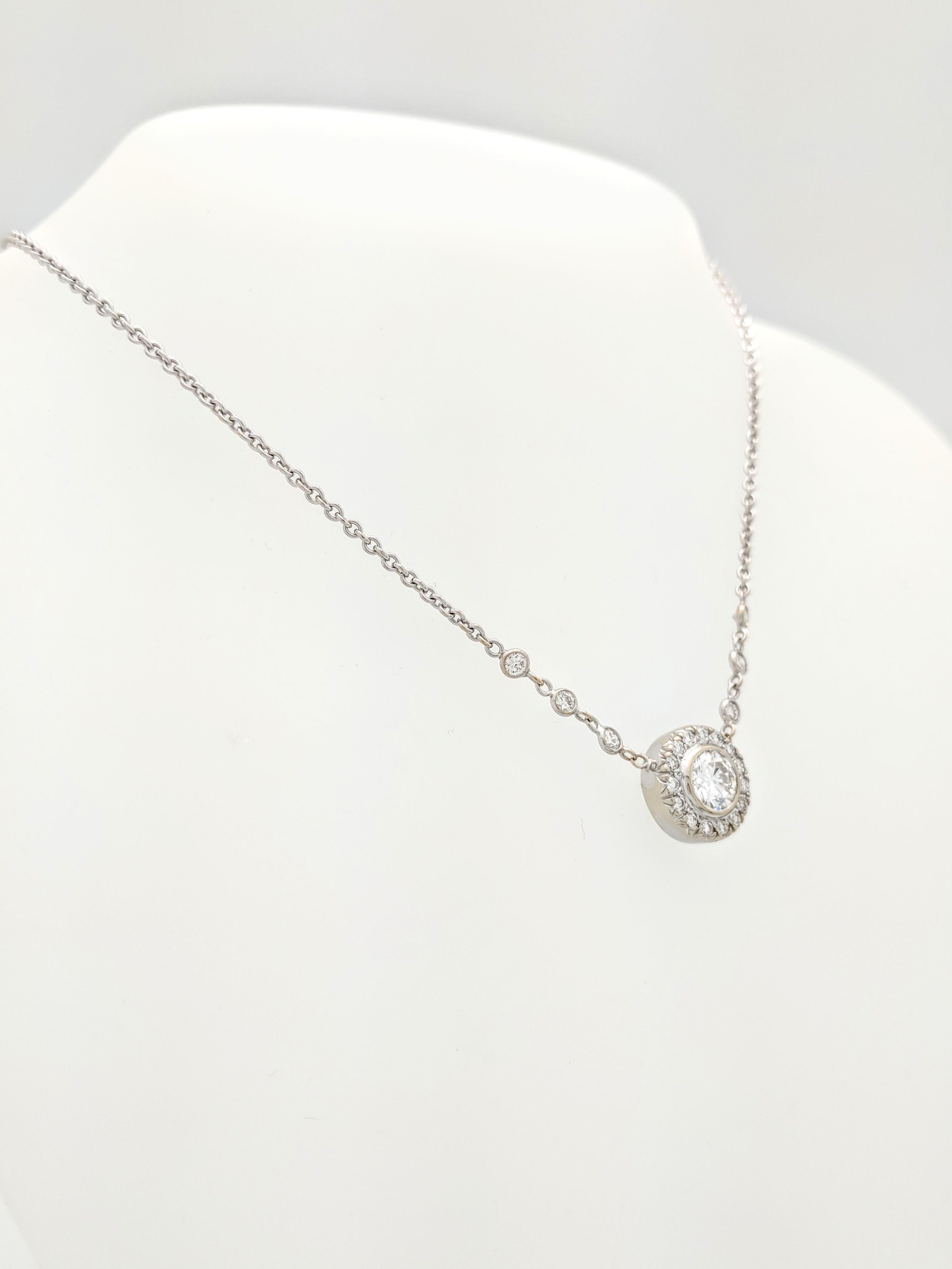 Contemporary 1.10 Carat Round Diamond Bezel Set in 18 Karat White Gold Halo Pendant Necklace