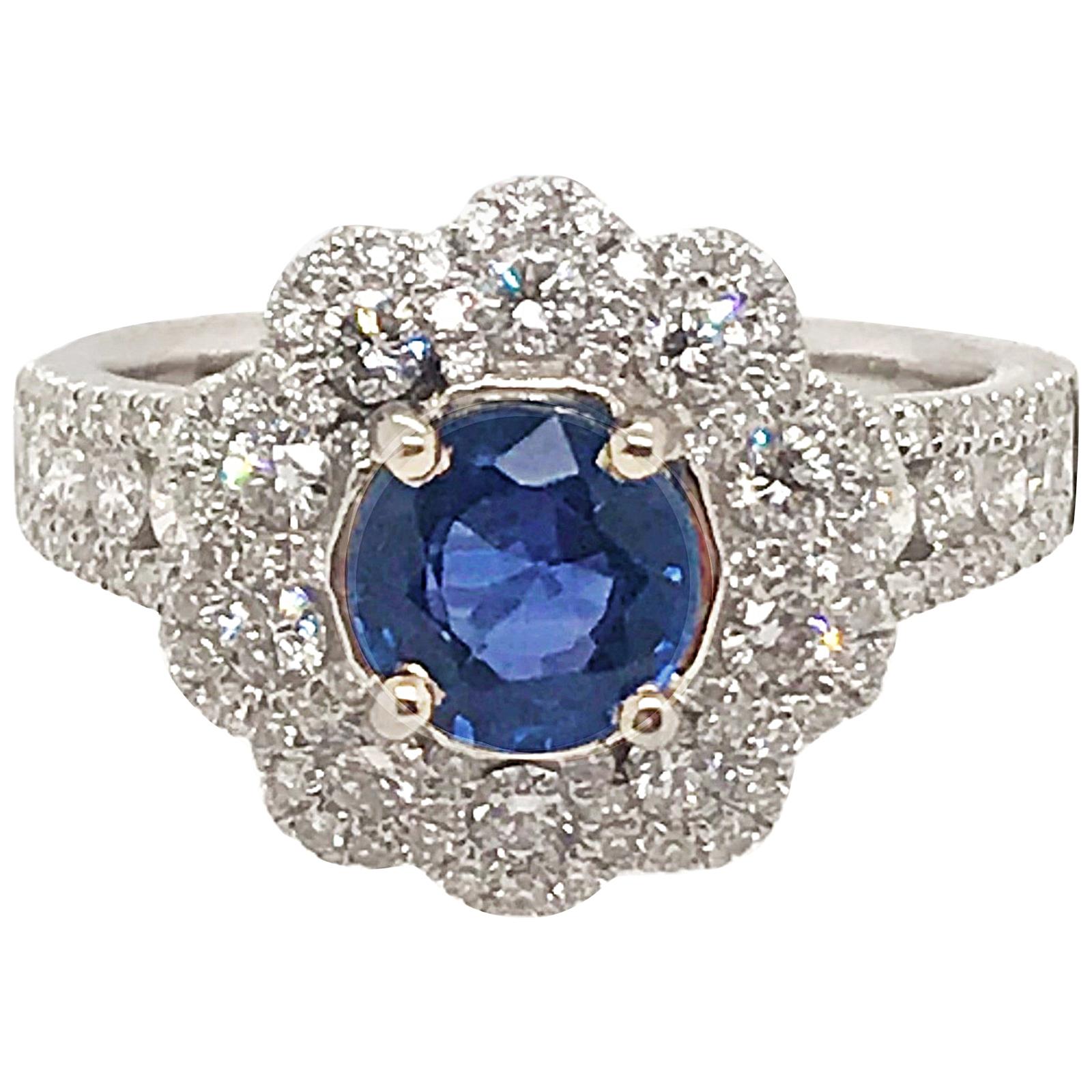 1.10 Carat Round Sapphire Ring with .95 Diamonds Set in 18 Karat White Gold For Sale