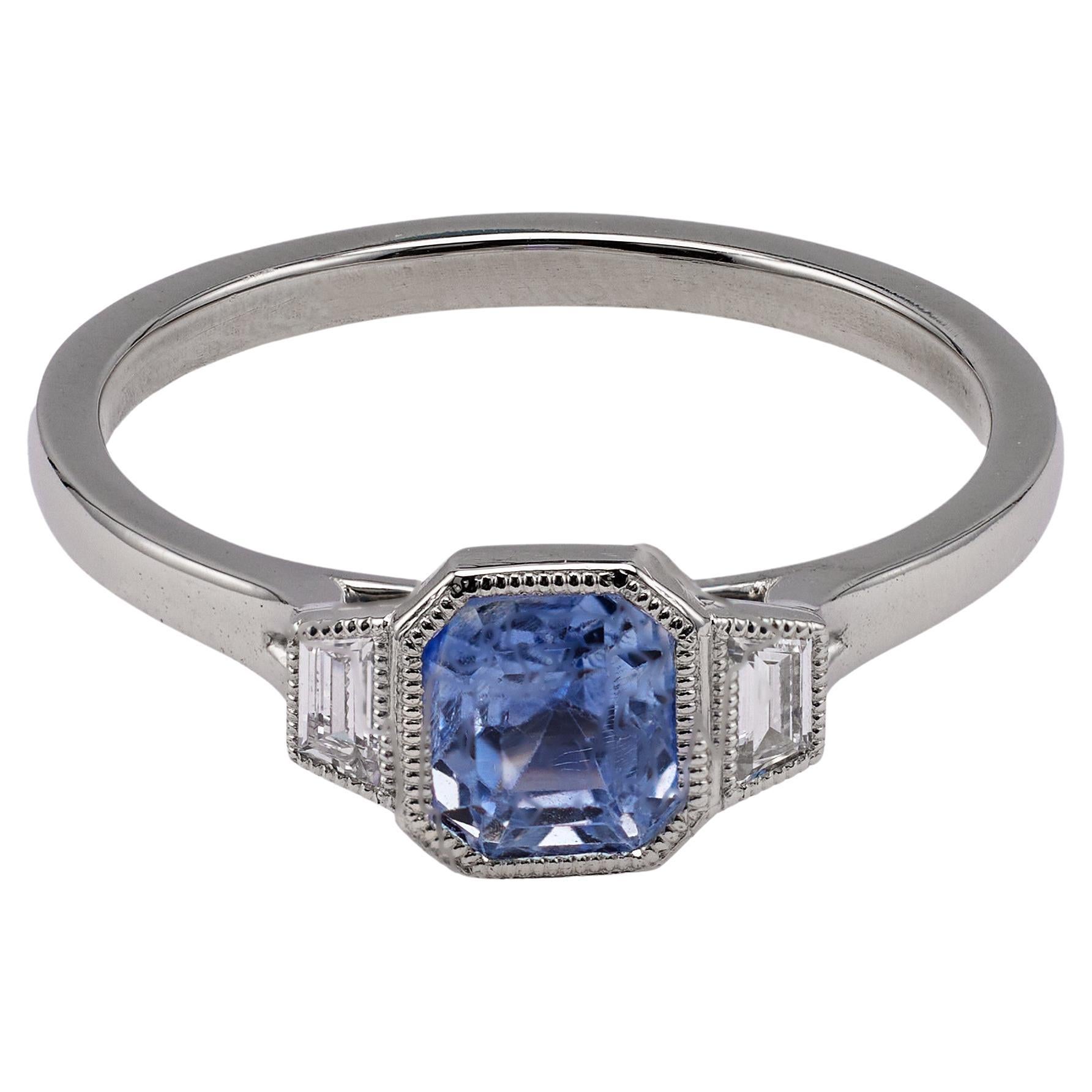 1.10 Carat Sapphire and Diamond Platinum Bezel Set Three Stone Ring For Sale