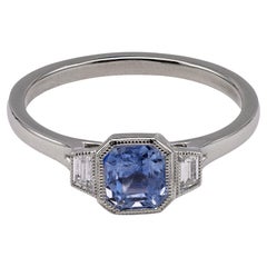 Used 1.10 Carat Sapphire and Diamond Platinum Bezel Set Three Stone Ring