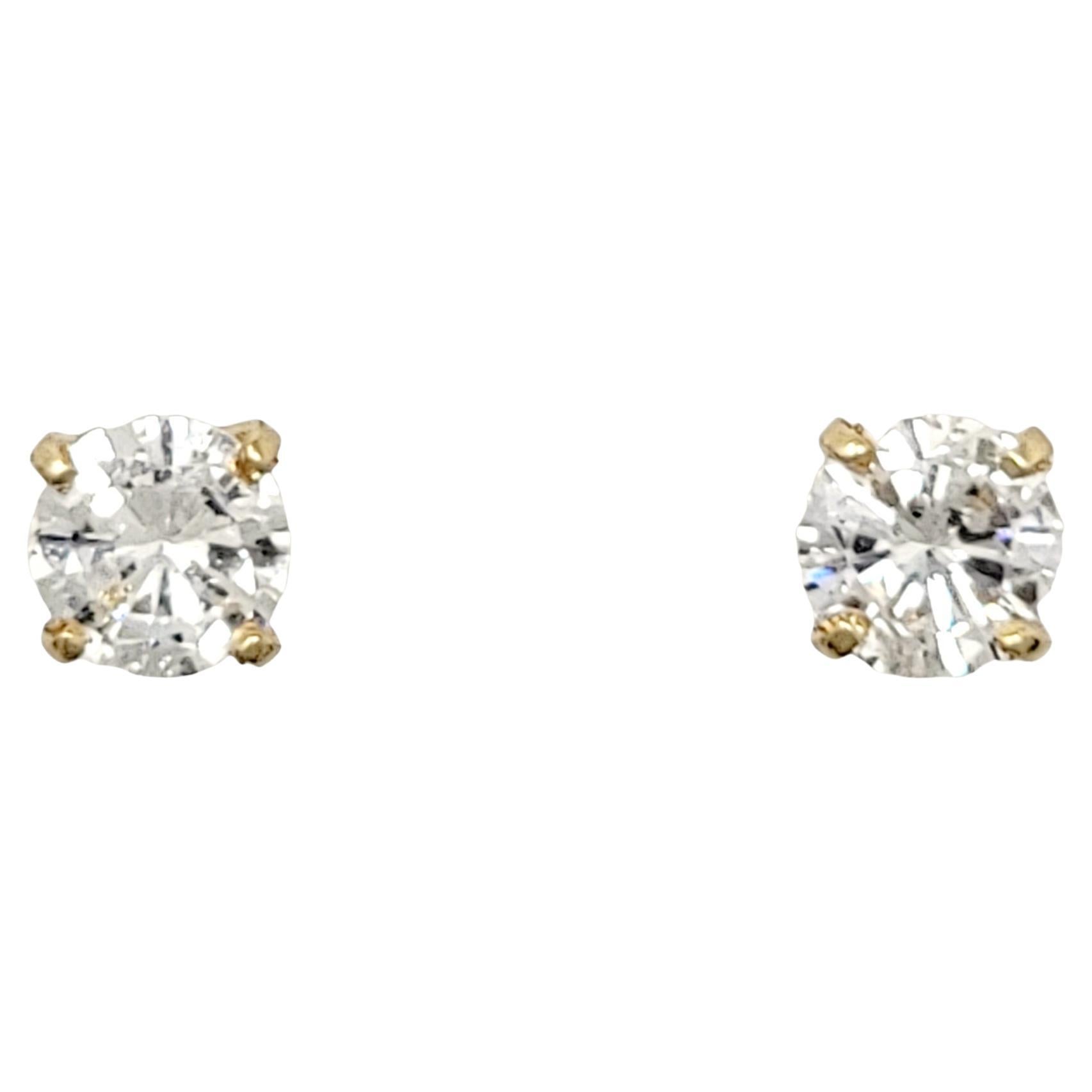 Contemporary 1.10 Carat Total Round Brilliant Solitaire Diamond Stud Earrings in Yellow Gold
