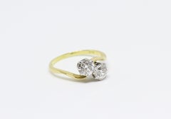 1.10 Carat Two-Stone Cross-Over Diamond Twist Engagement Ring, circa 1920s