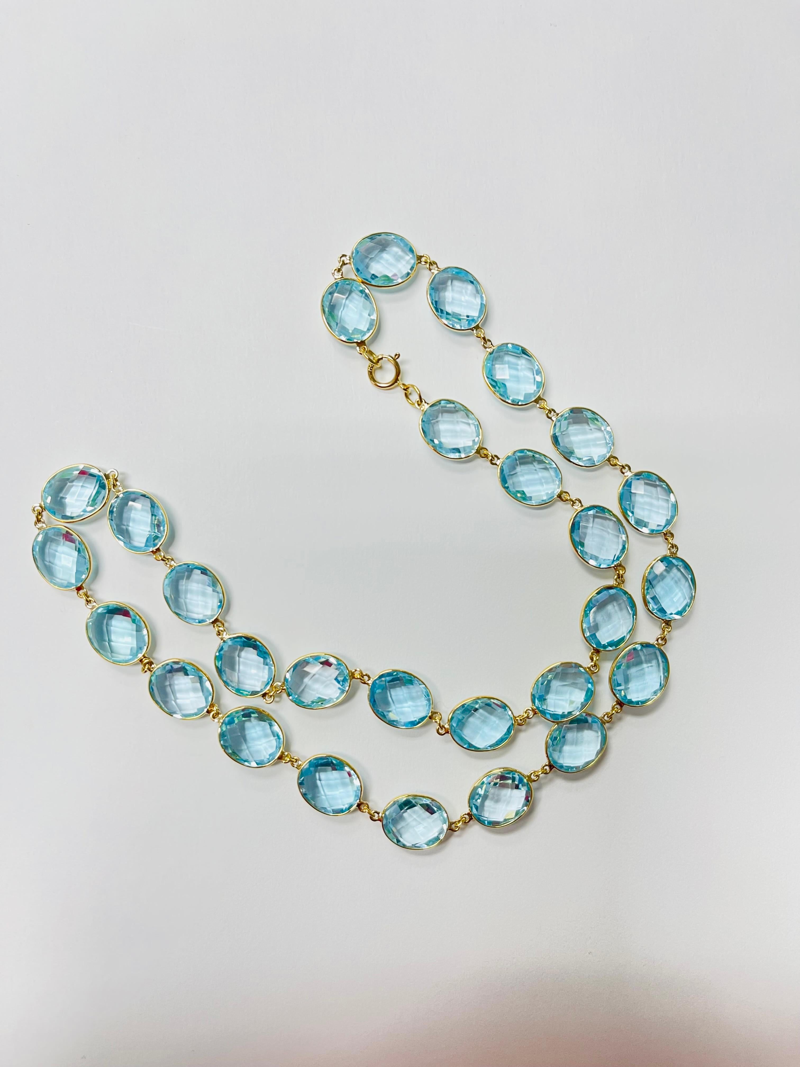110 Carats Blue Topaz Necklace in 18K Yellow Gold 1