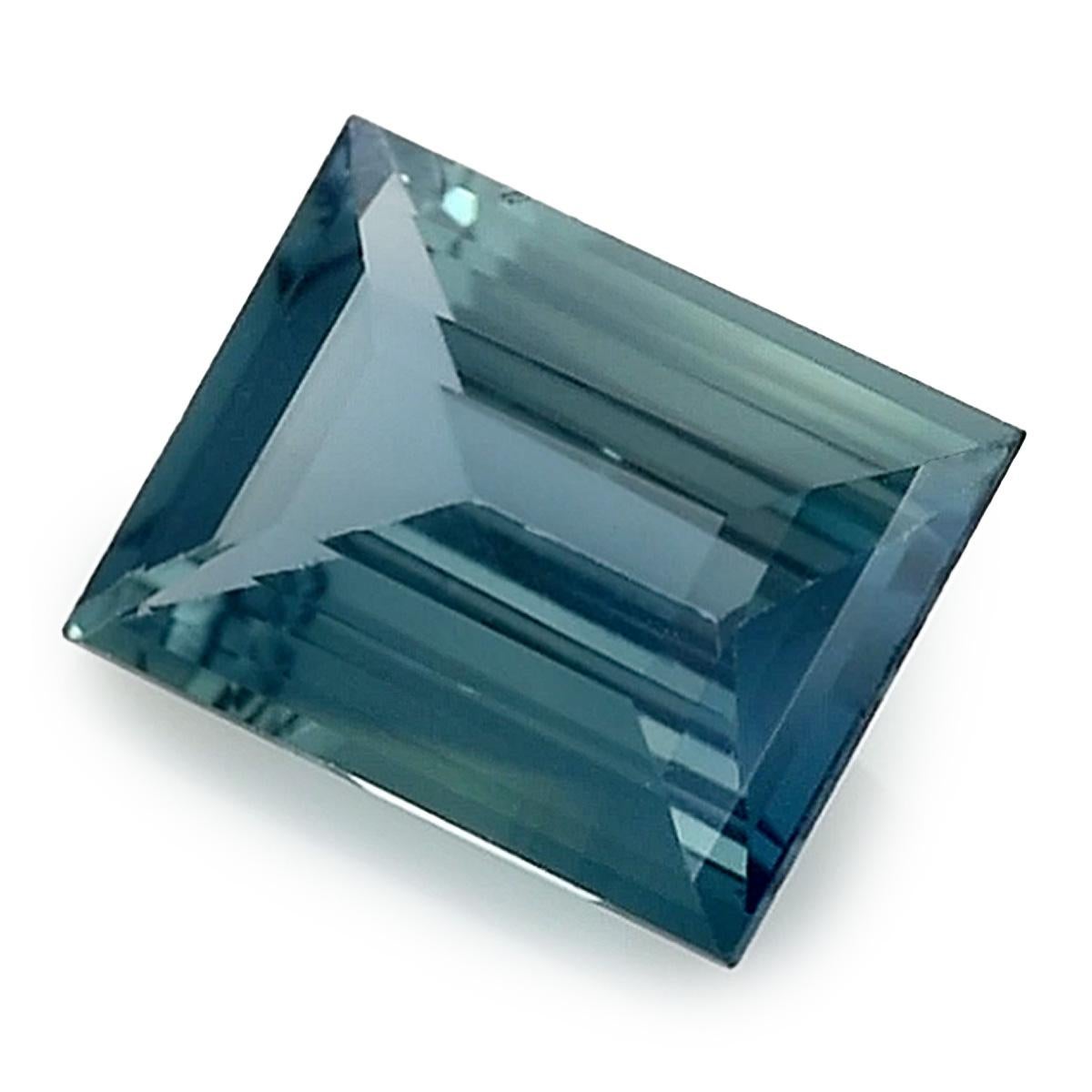 Introducing a Natural Green Sapphire of 1.10 carats, featuring a captivating Rectangle shape with precise measurements of 7.08 x 5.25 x 2.81 mm. The gem's brilliance is accentuated by the Brilliant/Step cut, revealing a beautiful Green Blue color.