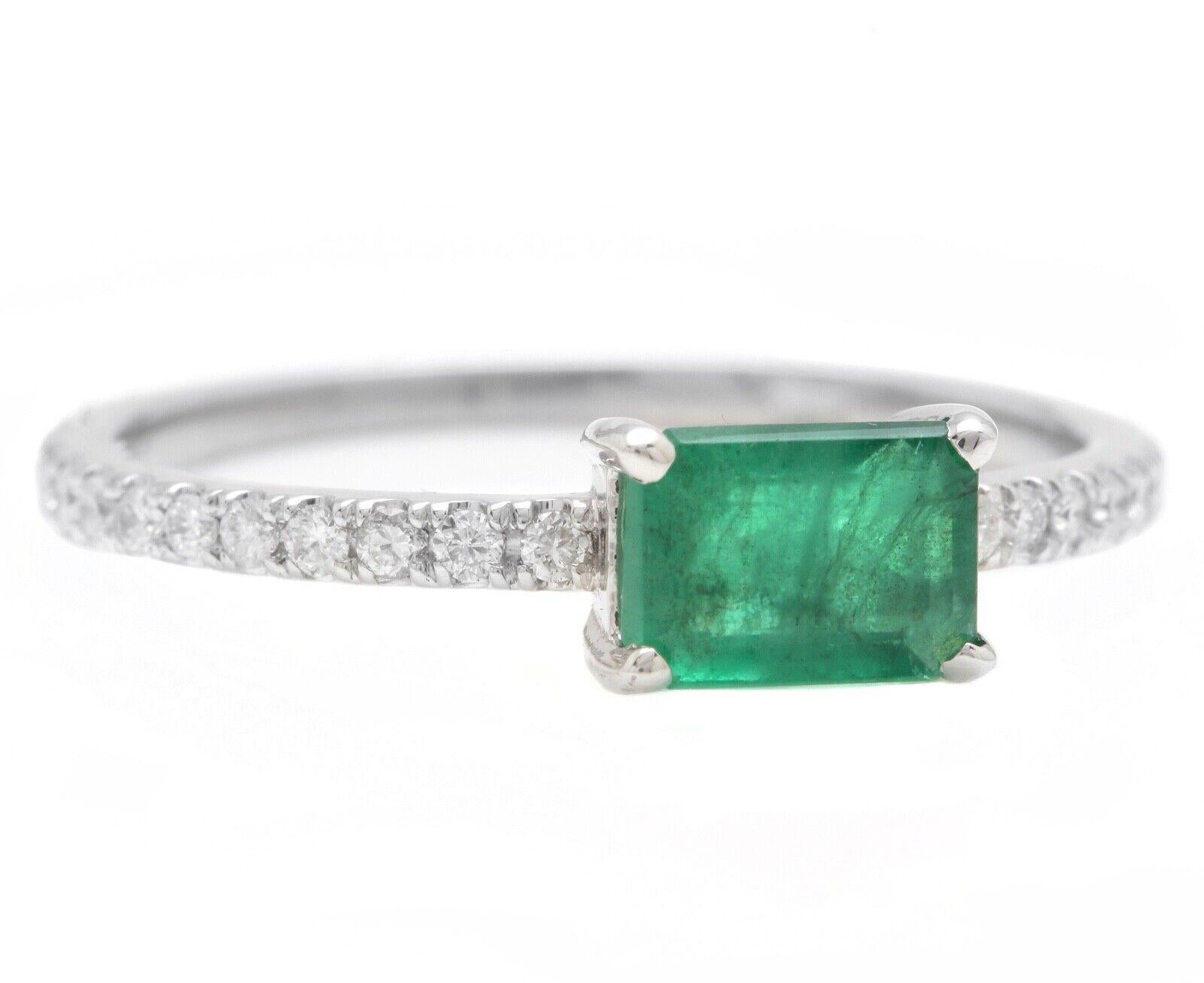 1.10 Carats Natural Emerald and Diamond 14K Solid White Gold Ring

Suggested Replacement Value: $3,500.00

Total Natural Green Emerald Weight is: Approx. 0.80 Carats (transparent)

Emerald Measures: Approx. 6.80 x 4.80mm

Natural Round Diamonds