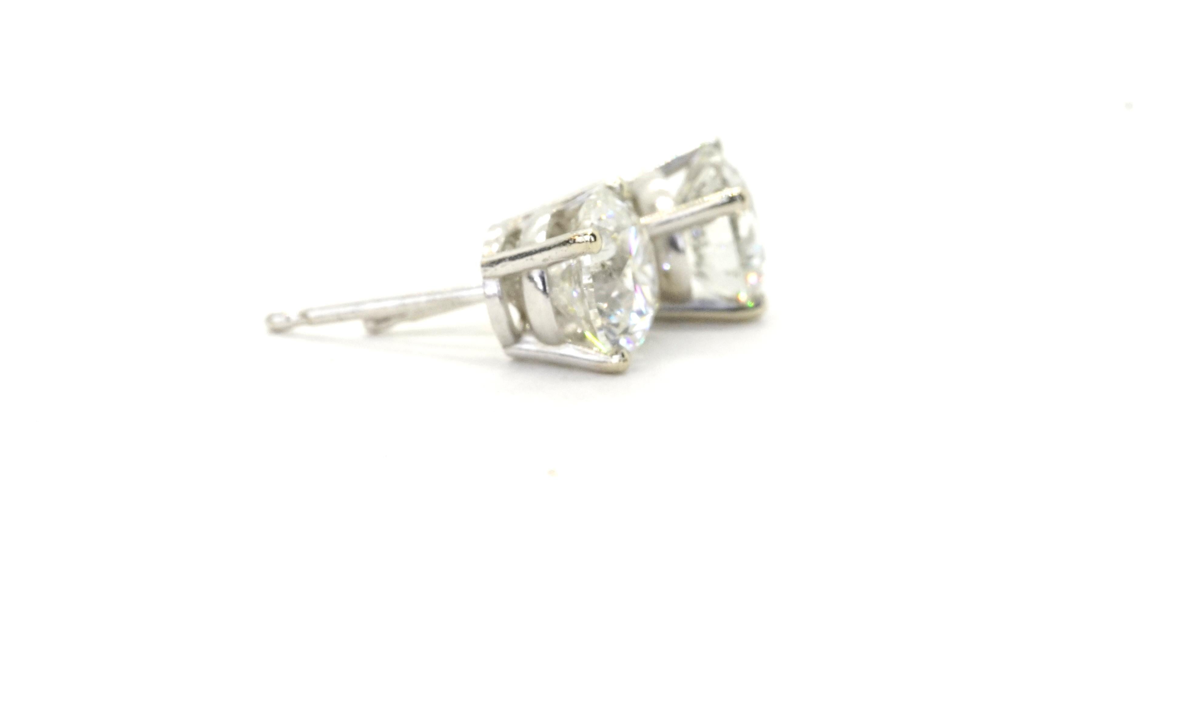 Brilliant Cut 1.10 Carats Total Diamond Stud Earrings For Sale