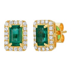 Pendientes de oro amarillo de 14 quilates con esmeralda colombiana de 1,10 quilates y diamantes de 0,30 quilates