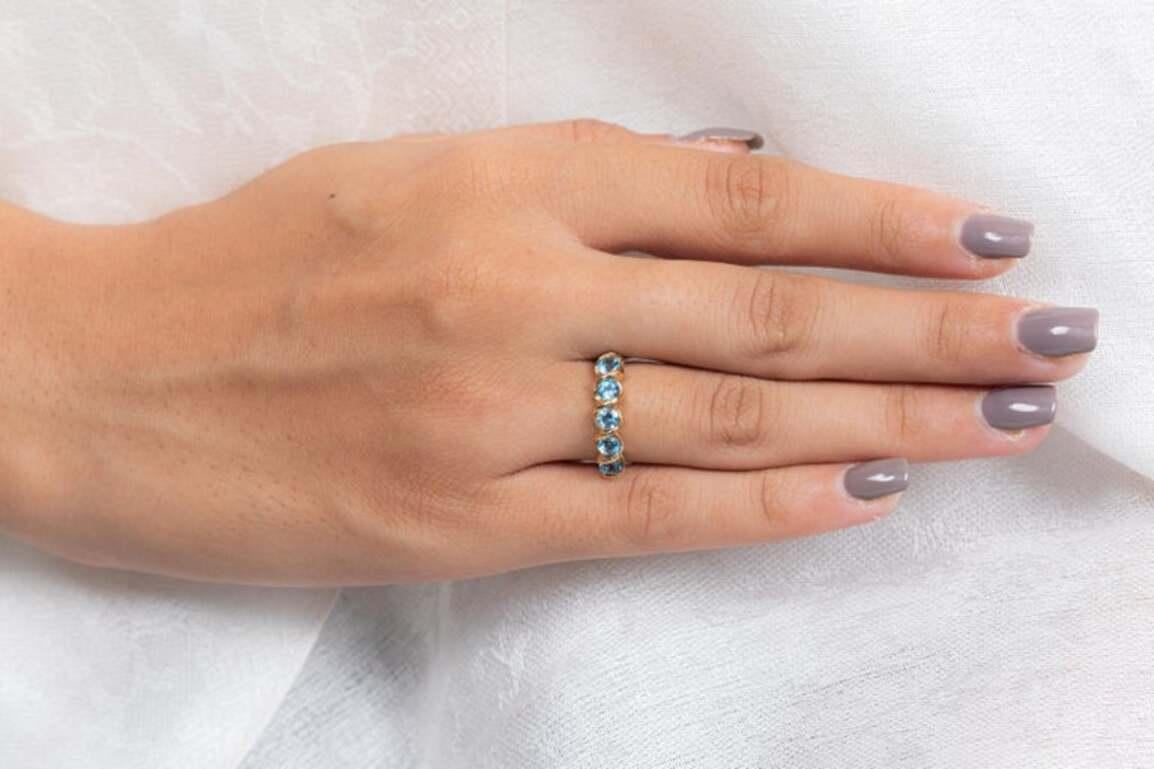 For Sale:  1.10 CT Round Cut Blue Topaz Half Eternity Band Ring in 14k Solid Yellow Gold 8