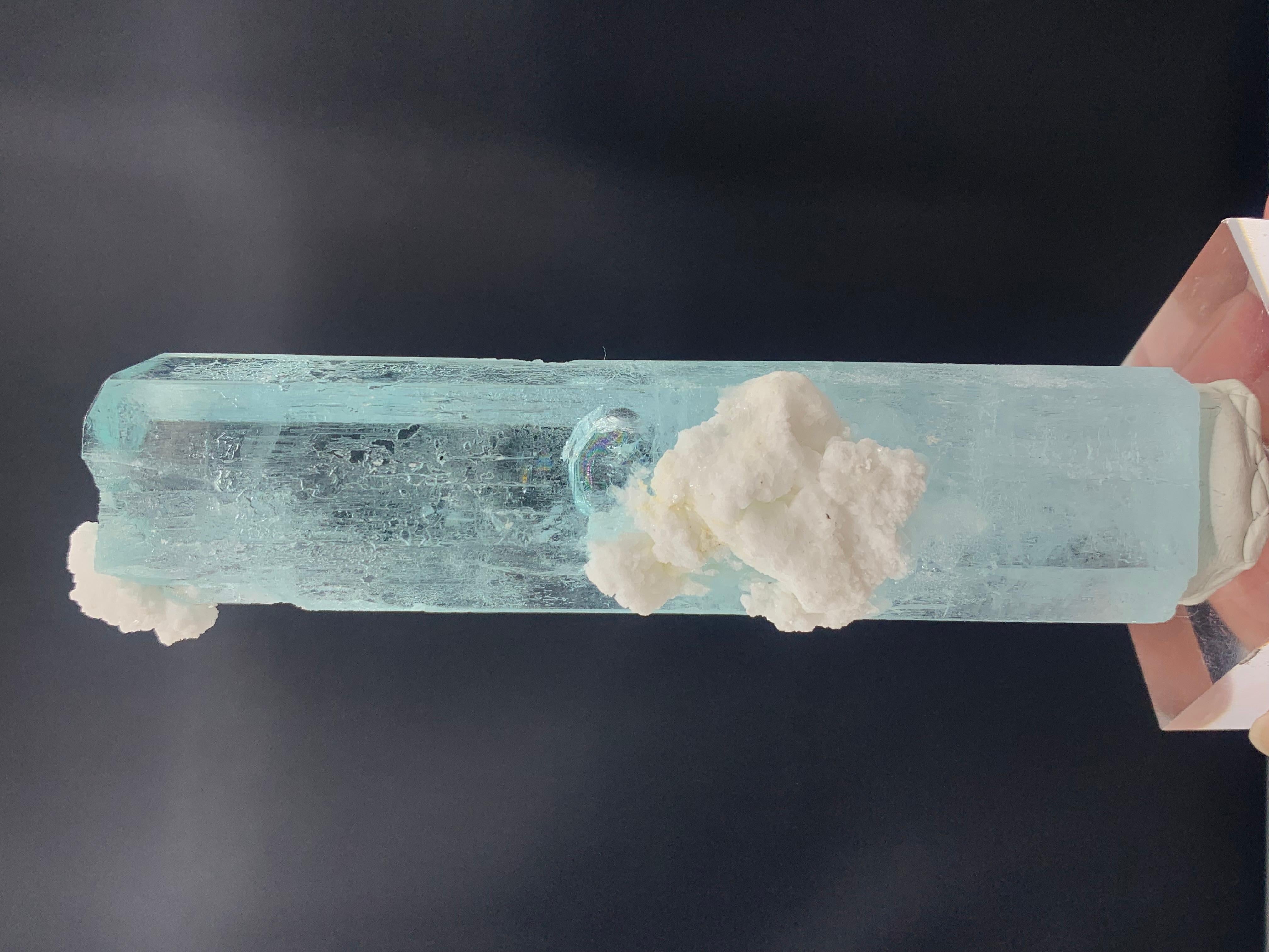 Glamorous Aquamarine Specimen From Nagar Valley Gilgit, Pakistan 
WEIGHT: 110 gram
DIMENSIONS: 10.9 x2.5 x 1.8 Cm
ORIGIN: Nagar Valley, Gilgit Baltistan Pakistan 
TREATMENT: None
Aquamarine is a pale-blue to light-green variety of beryl. The