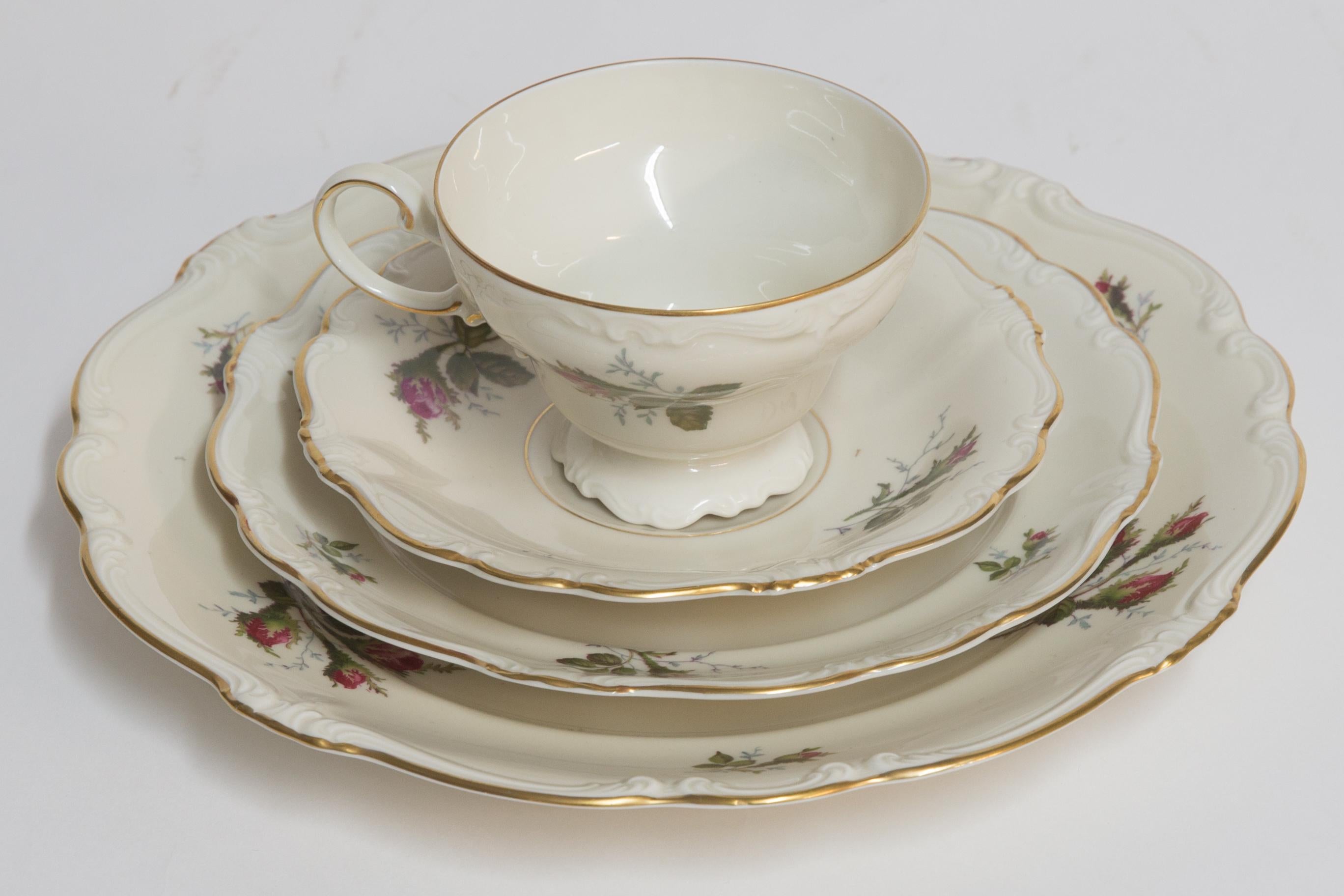 Offered is an extensive Rosenthal Pompadour pattern porcelain midcentury dinner service for 12 with a number of serving pieces approximately 110 pieces in good condition.