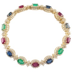 11.00 Carat Diamond, Ruby, Emerald and Sapphire 14 Karat Gold Station Bracelet