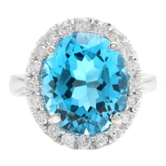 Impressionnante bague en or massif 14 carats avec topaze bleue naturelle suisse de 11,00 carats et diamants