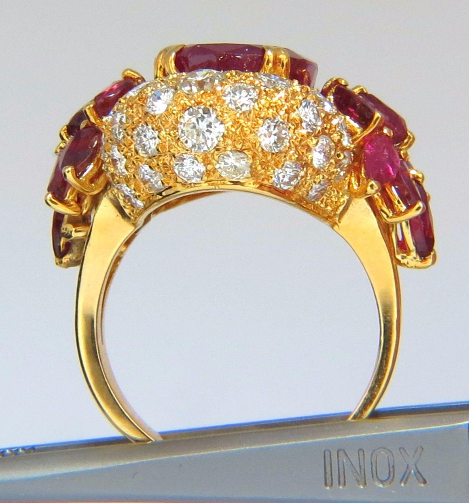 2.00ct. Natural Ruby Cocktail Ring

13.5 X 10.0mm

Full cut oval brilliant, opaque 



2.00ct. round Shaped diamonds.

G- color Vs2



Additional side rubies: 1.00ct

  14kt. yellow gold

13 grams

Ring Current size: 7.5

Ring is 25mm wide

Depth