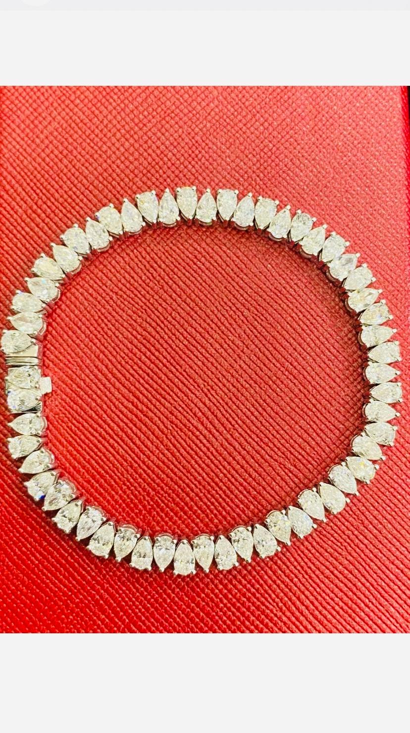 An exquisite tennis bracelet , so elegant and refined style. 
Elevate your timeless of beauty and add a touch of class and charm.
Stunning bracelet come in 14k gold with lustrous Natural Diamonds of 11,00 carats, in perfect pear shape, H color SI1