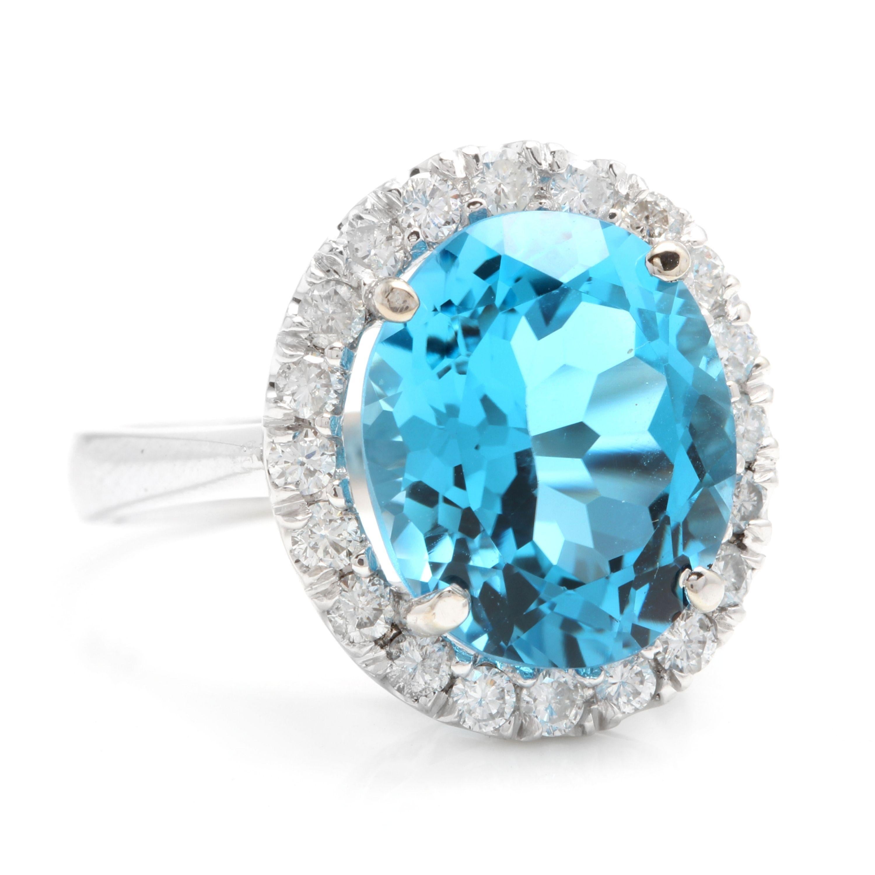 11.00 Carats Impressive Natural Swiss Blue Topaz and Diamond 14K Solid White Gold Ring

Total Swiss Topaz Weight is: Approx. 10.00 Carats

Topaz Treatment: Heating

Topaz Measures: Approx. 14.00 x 10.00mm

Natural Round Diamonds Weight: Approx. 1.00