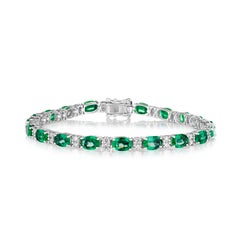 11.00ctw Oval Emerald & Round Diamond Bracelet in 14KT Gold