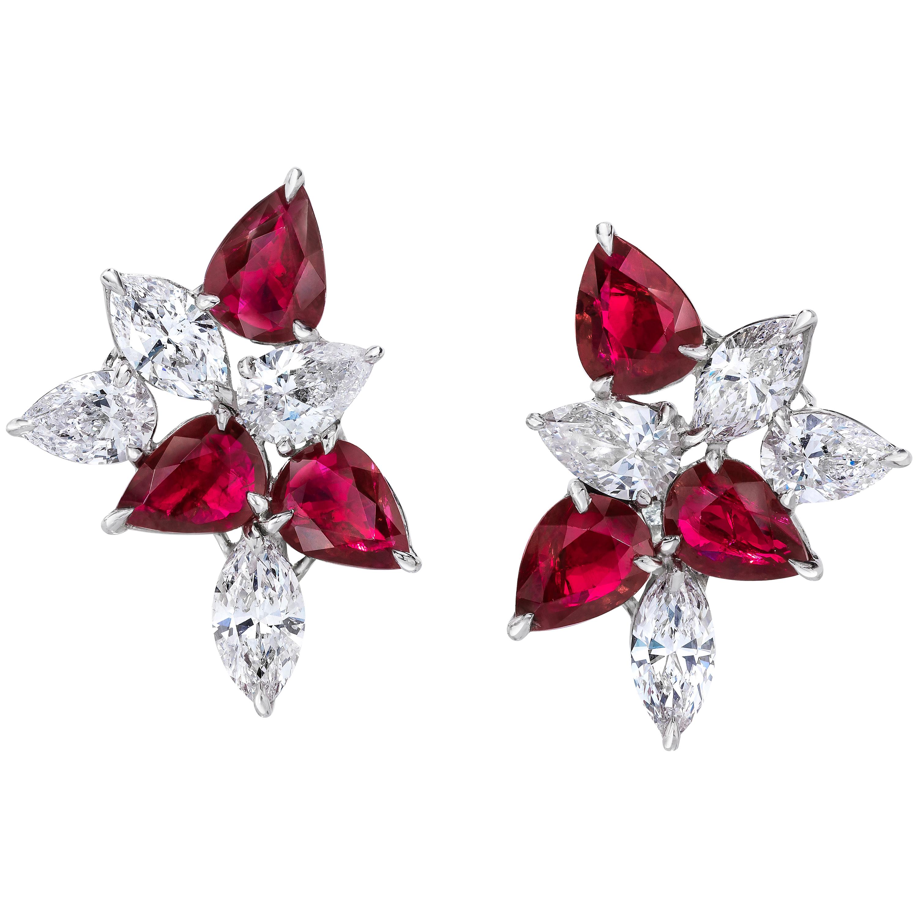 The Classic Cluster Earring. Redefined. Set with Rubies and Diamonds and Set in Platinum and 18 Karat White Gold.

Rubies totaling 7.17 Carats.
Diamonds Totaling 3.84 Carats.
11.01 Carats Total