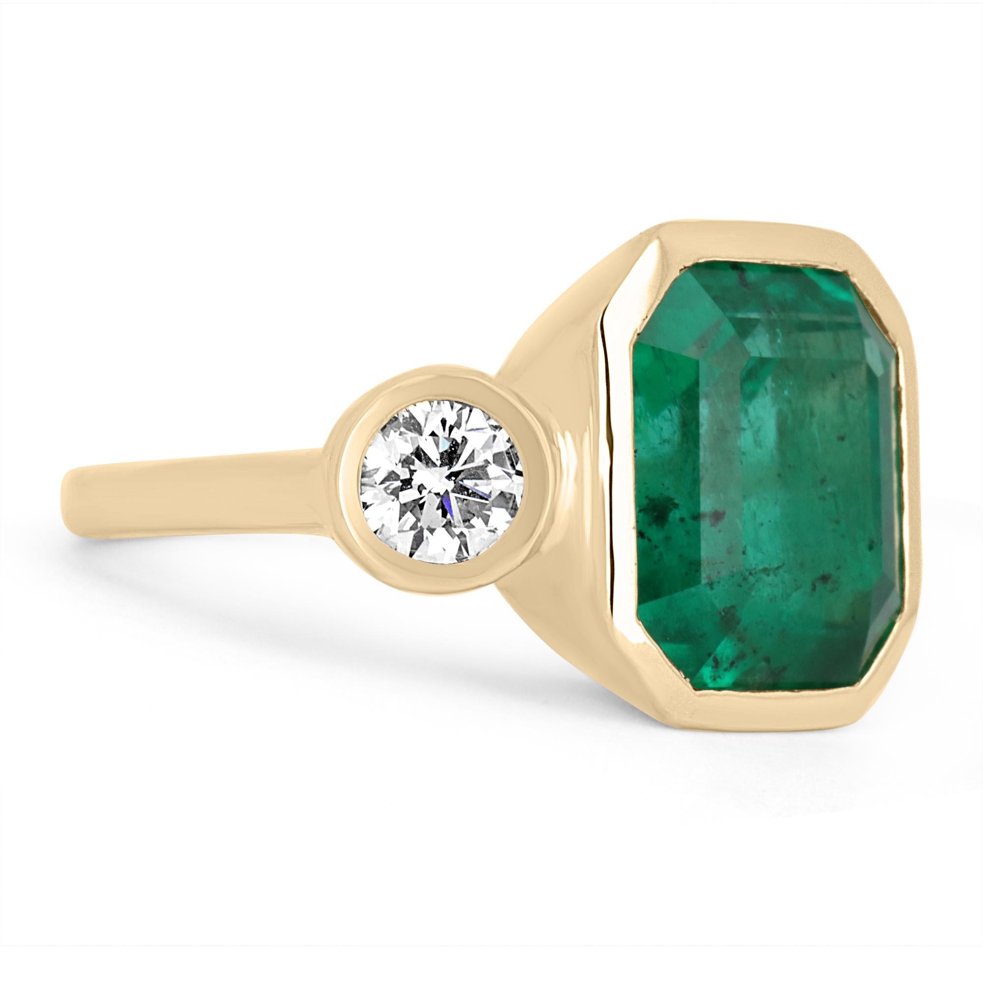 Designed and created by Jorge Rodriguez. Dexterously crafted in fine 18K yellow gold, this ring features a high quality, 10.0-carat natural Colombian emerald, emerald cut from the famous Muzo mines. Set in a secure bezel setting for extra