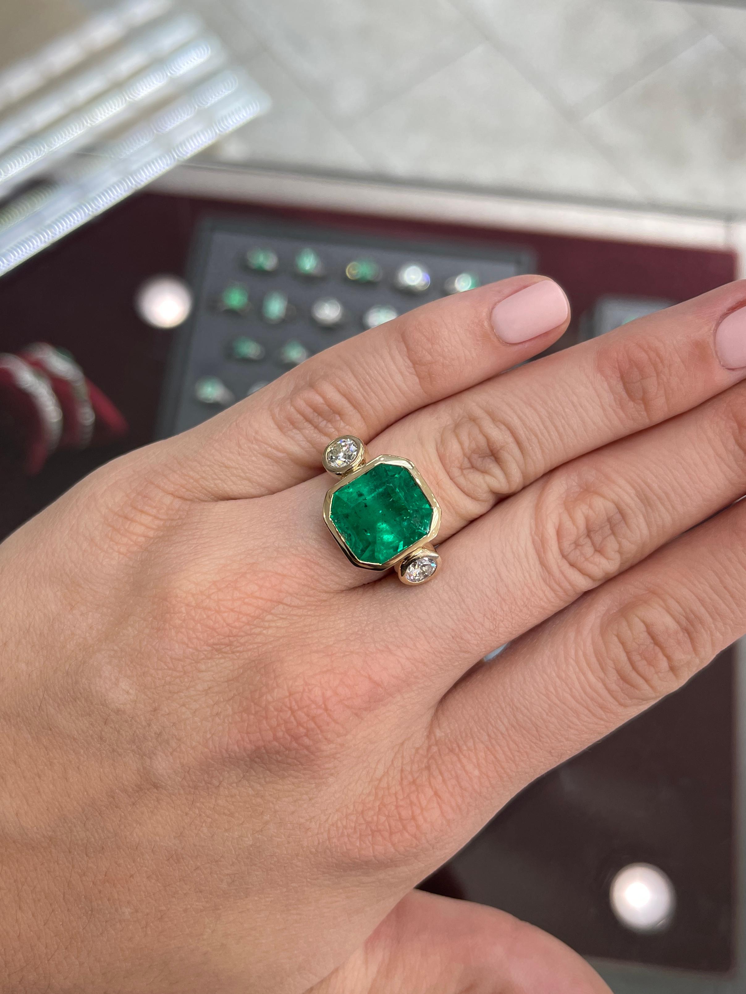 Modern 11.02tcw 18K Colombian Emerald-Emerald Cut & Round Diamond Three Stone Ring For Sale