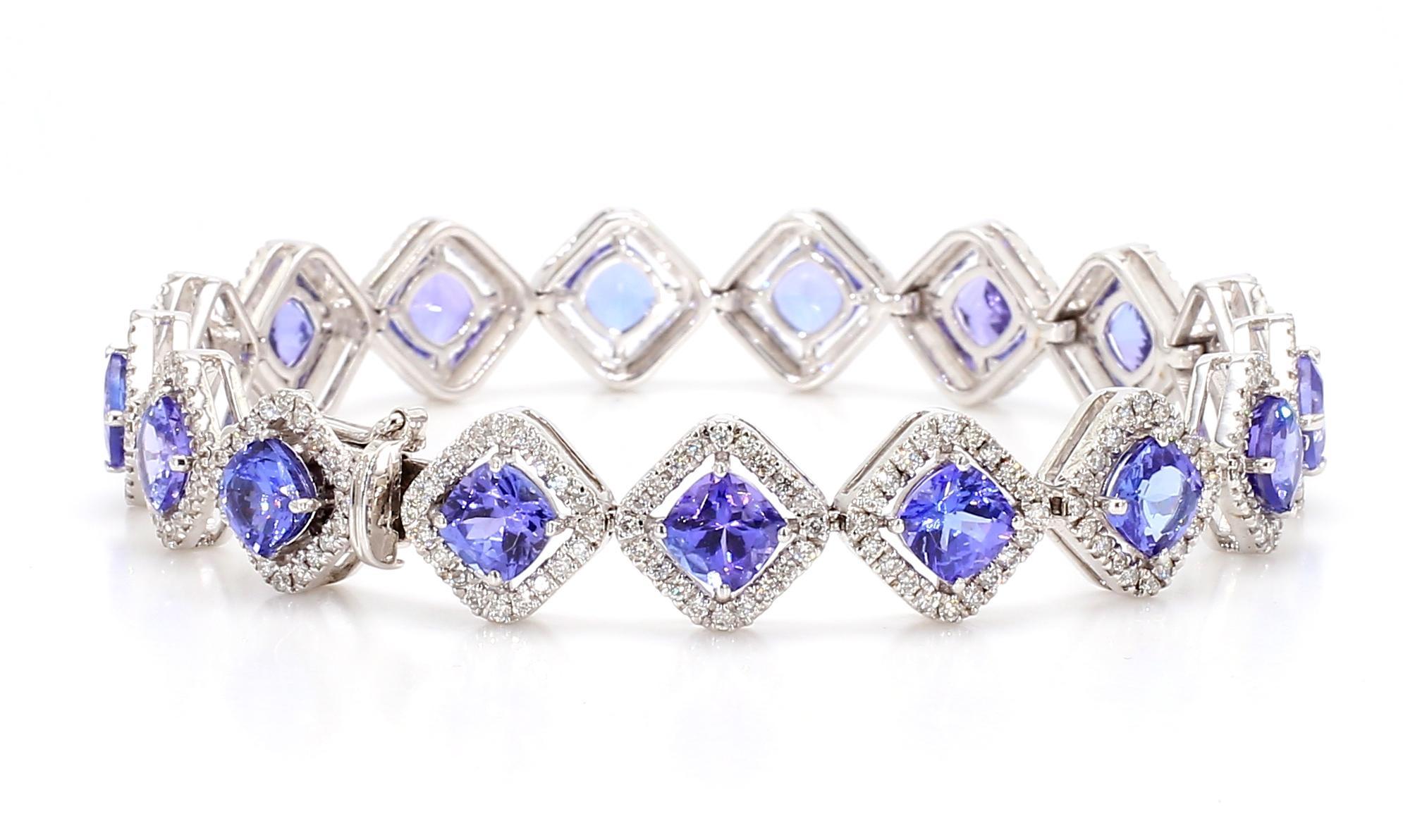 Indulge in the exquisite beauty of this Tanzanite and Diamond Bracelet, a stunning piece that combines luxury and elegance. Crafted in 18K gold with a substantial weight of 20.62 grams, this bracelet showcases the perfect blend of vibrant tanzanite