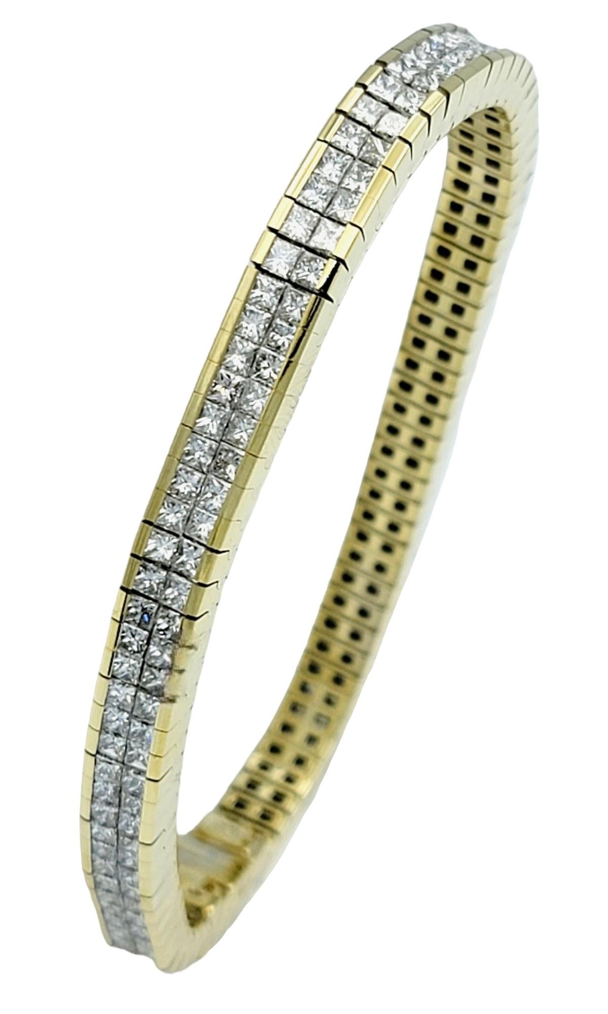 Elevate your style with this stunning diamond tennis bracelet, crafted in luxurious 18 karat yellow gold. This exquisite piece features a mesmerizing snake-link design adorned with an impressive 11.05 carats of shimmering invisible set princess cut