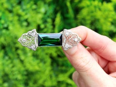 11.06 Carat Tourmaline 0.18 Carat Diamond 14k Yellow Gold Brooch