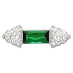 11.06 Carat Tourmaline 0.18 Carat Diamond 14k Yellow Gold Brooch