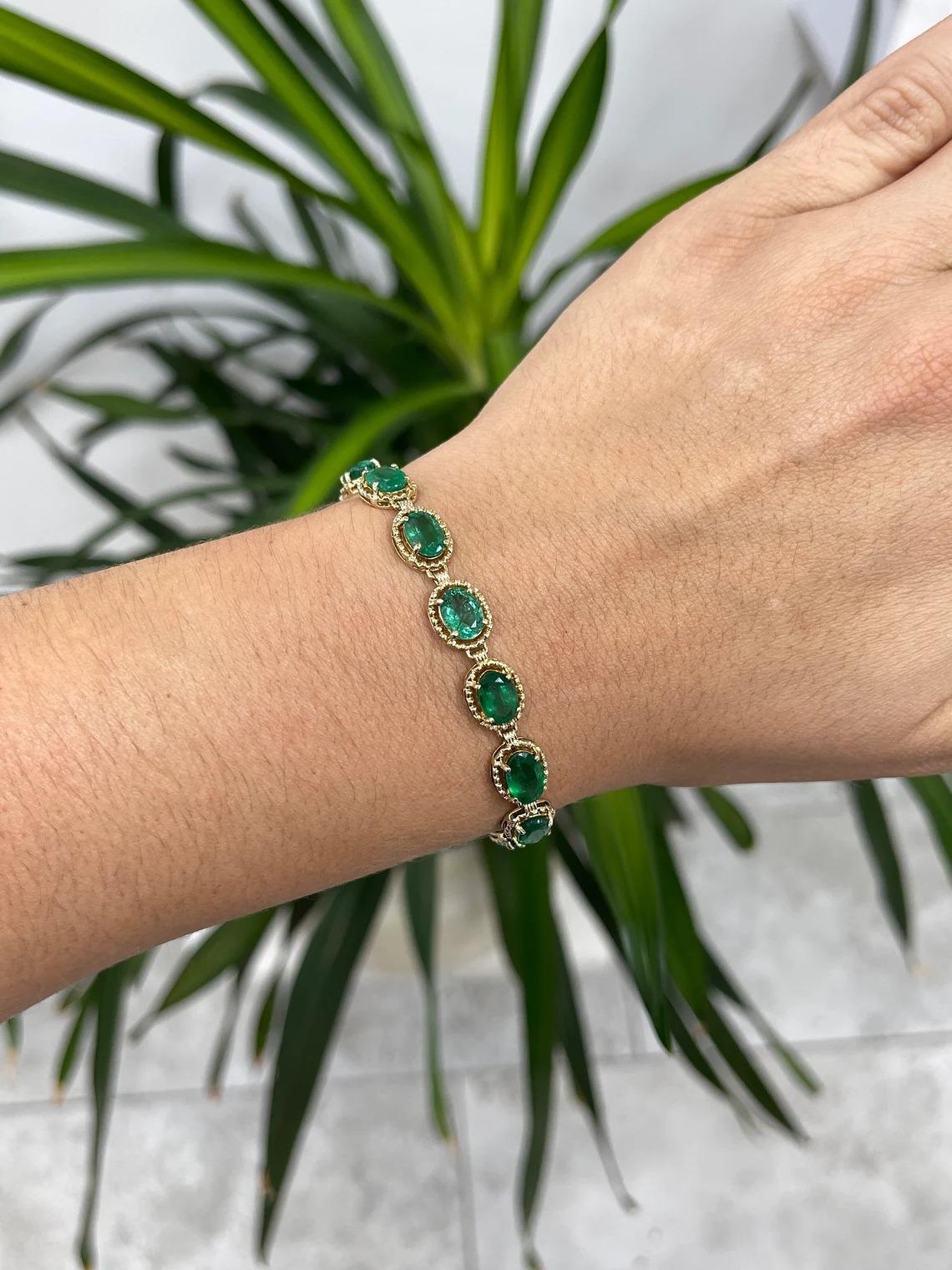 Behold this one-of-a-kind treasure! This classical natural multi emerald bracelet is remarkable in every way possible. It features fourteen different oval-cut emeralds all varying in color, clarity, and luster; they all share in common its rich