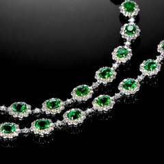 11.07 Carat Natural Emeralds and Diamonds Tennis Necklace Made in Platinum