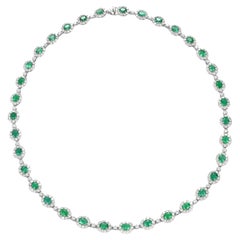 11.07 Carat Natural Emeralds and Diamonds Tennis Necklace Made in Platinum