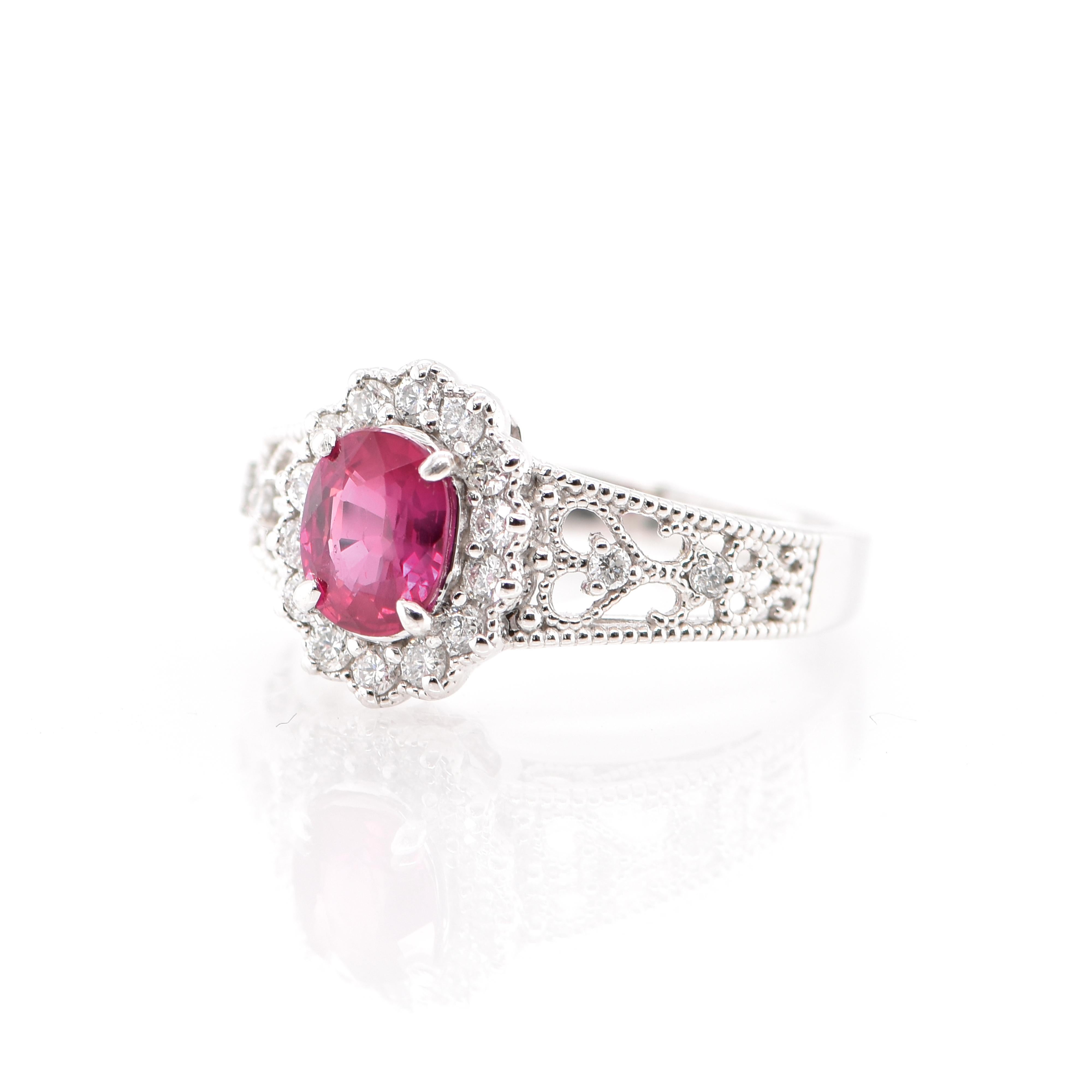 A beautiful Ring featuring a 1.108 Carat No Heat (Untreated) Ruby and 0.30 Carats of Diamond Accents set in Platinum. Rubies are referred to as 