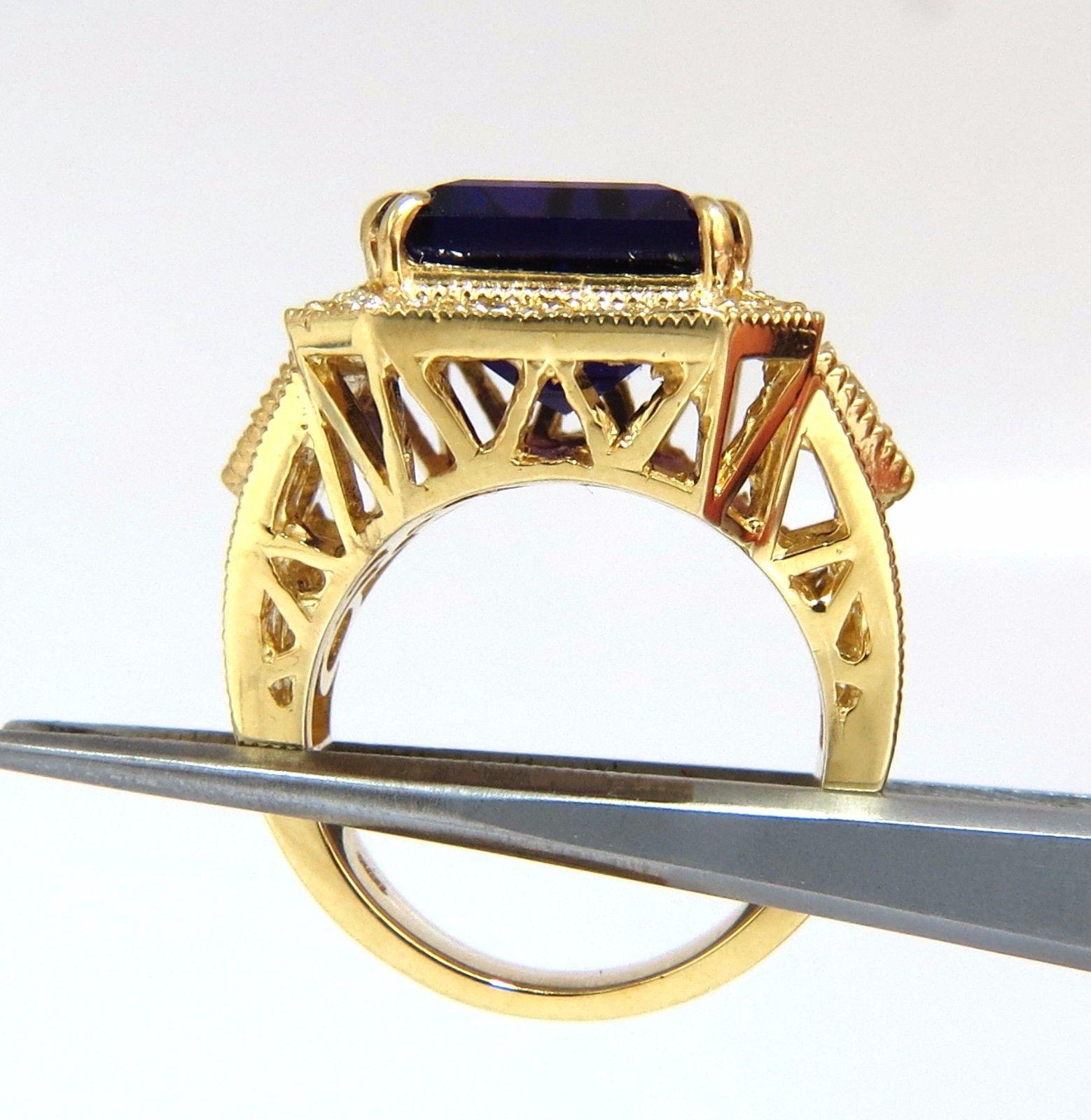 Purple Flash.

9.39ct. Natural Amethyst ring

Emerald cut, Full cut Brilliant

14 X 12mm 

Clean Clarity & Transparent

The Prime Purple Velvet Color

1.70ct natural round diamonds.

Fancy Yellow color Vs-2 clarity.

  14kt. yellow gold

Deck of