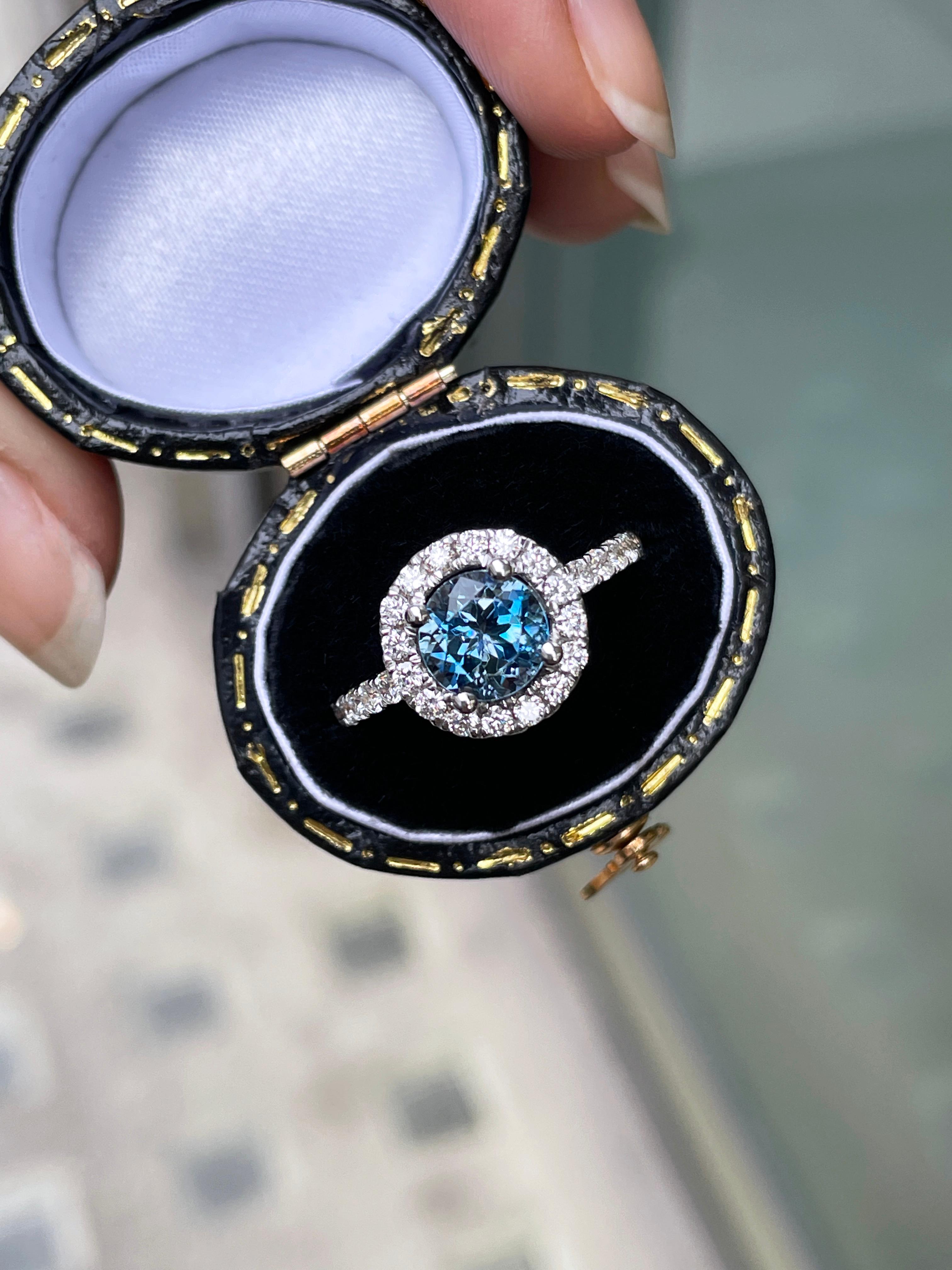 Modern 1.10 Carat Aquamarine and Diamond Halo 18 Carat Gold Engagement Ring For Sale