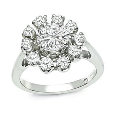 Anello d'oro con diamante centrale da 1,10 carati