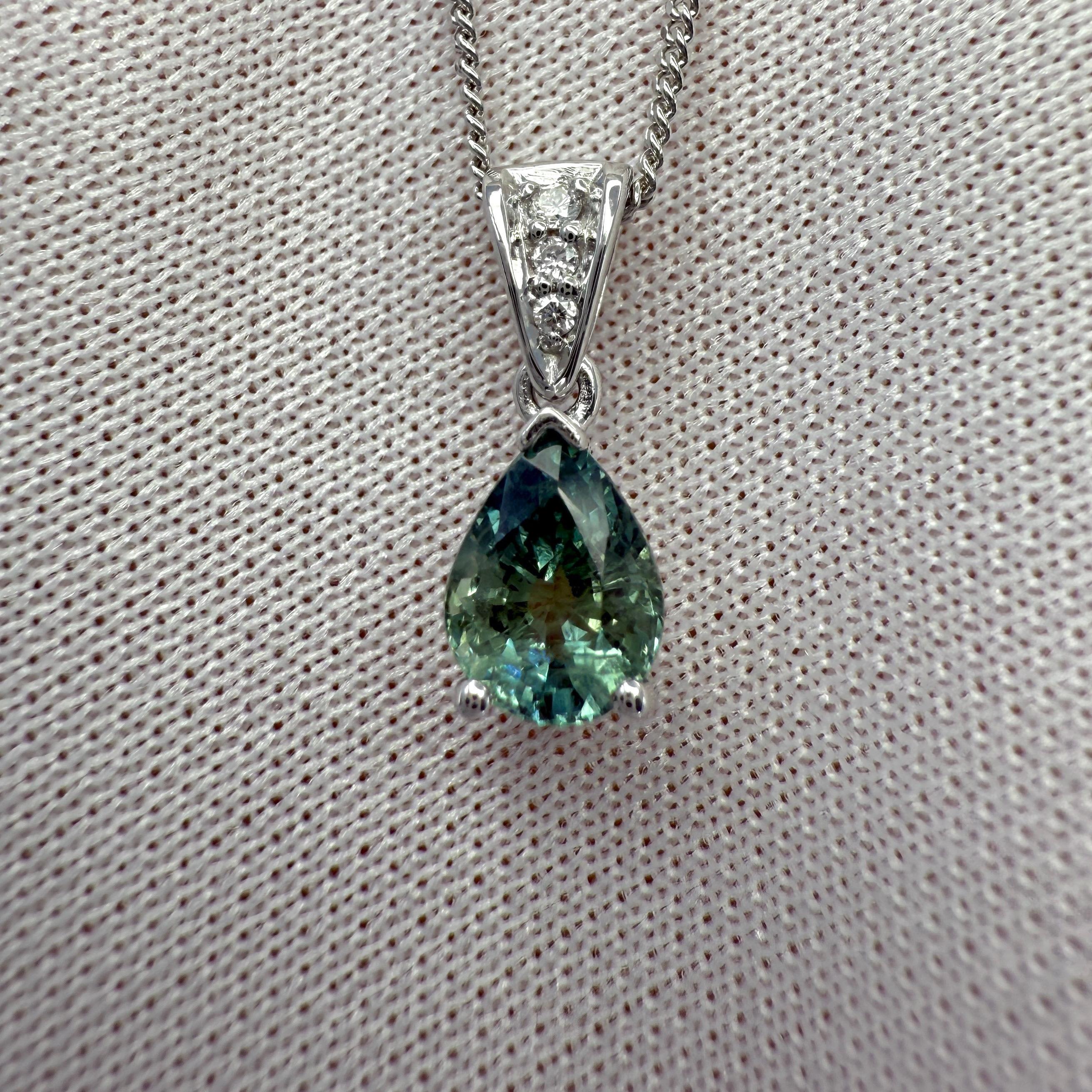 Natural Deep Green Blue Pear Cut Sapphire & Diamond Platinum Pendant Necklace.

1.10 Carat sapphire with a fine deep green blue colour and good clarity. Some small natural inclusions visible when looking closely. No breaks or cracks.

The sapphire