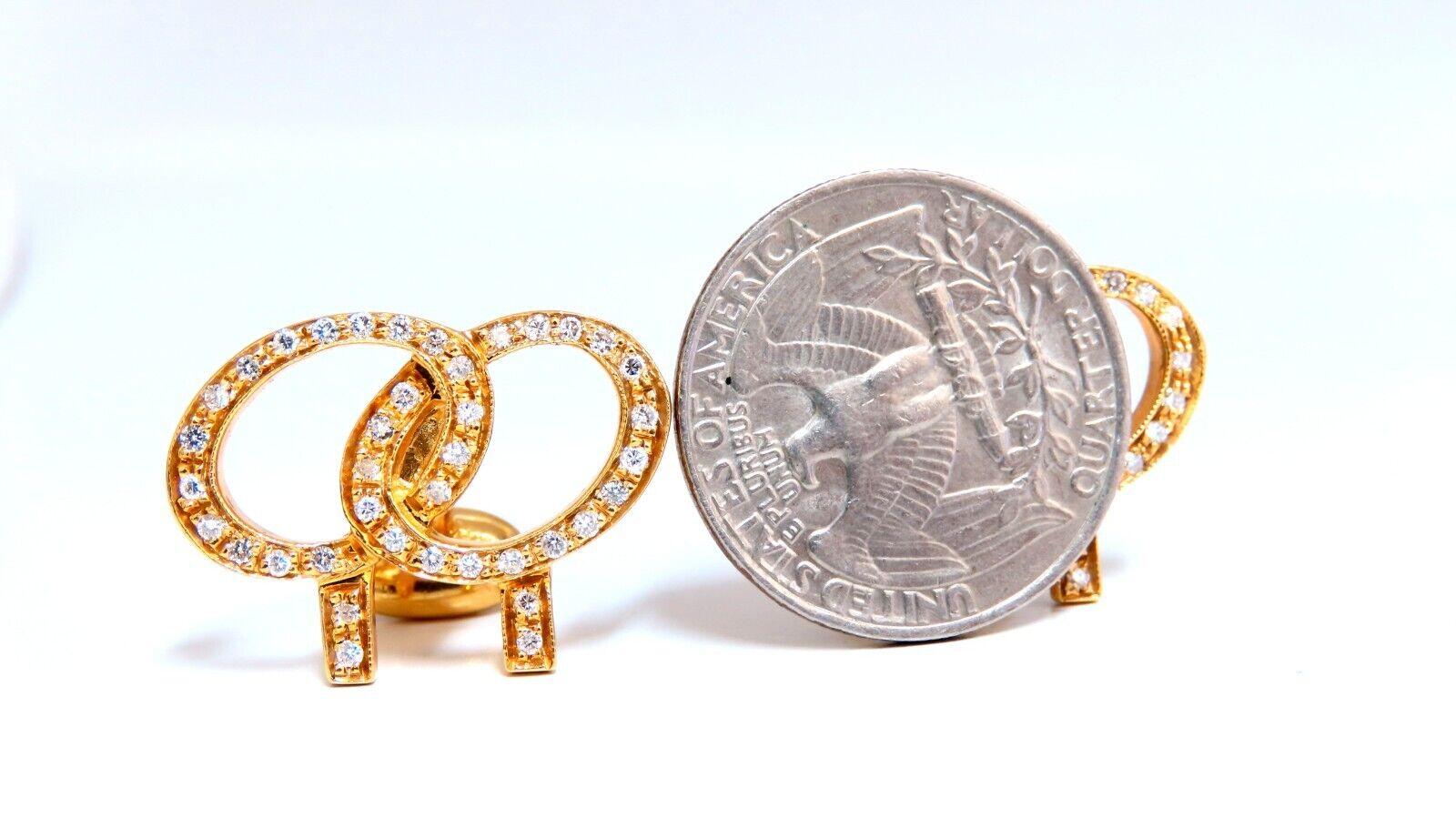 Doubletree employee cufflinks

25 x 18mm diameter top

1.10 carat natural round diamonds.

H-color vs2 clarity

14kt yellow gold

14 grams