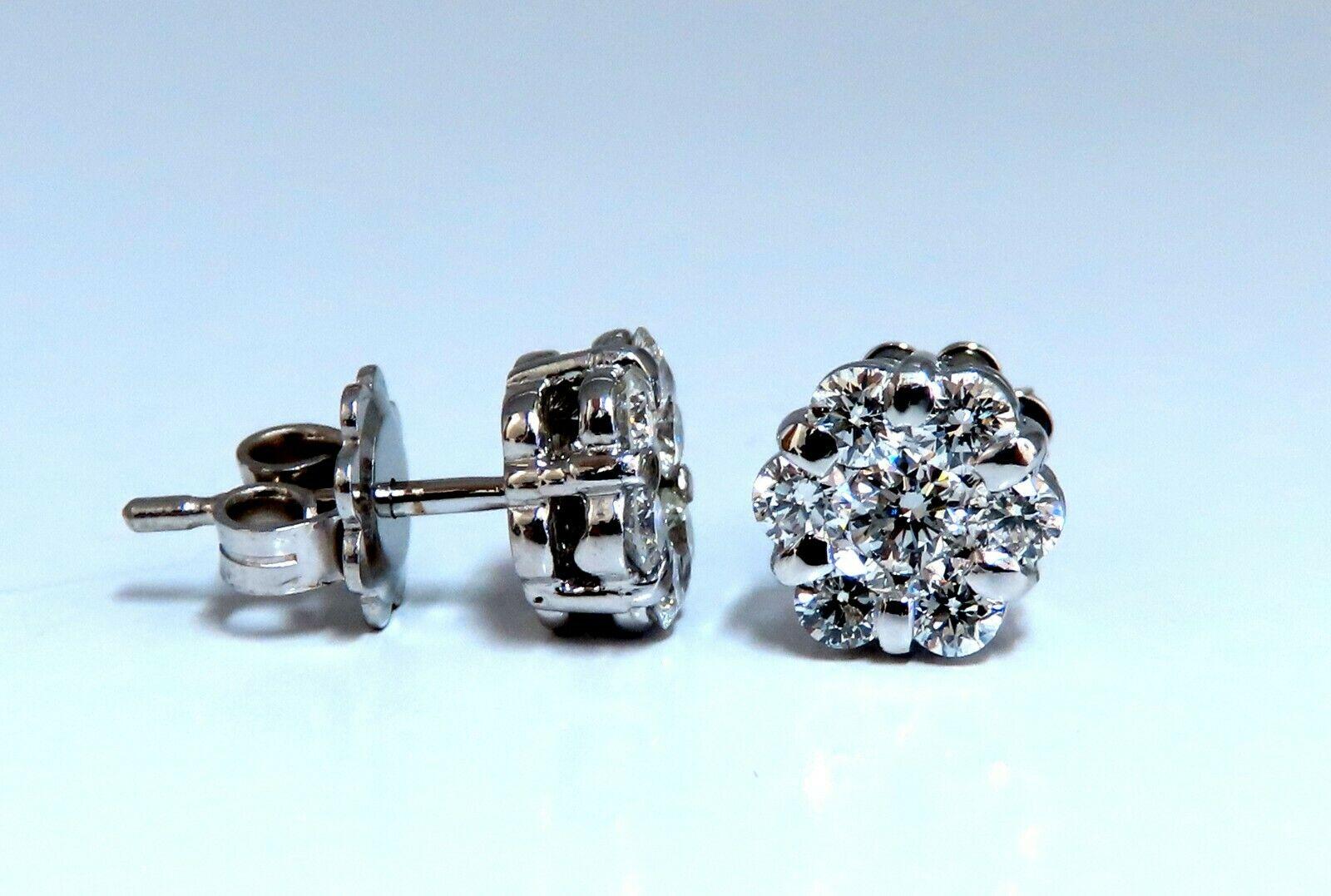 Cluster & Halo Stud Earrings.

1.10cts of natural round diamonds: 

G-color, Vs-2  clarity.

14kt. white gold

2.9 grams.

Earrings measure: .32 inch Diameter

Comfortable Butterfly

$4,000 Appraisal Certificate to accompany