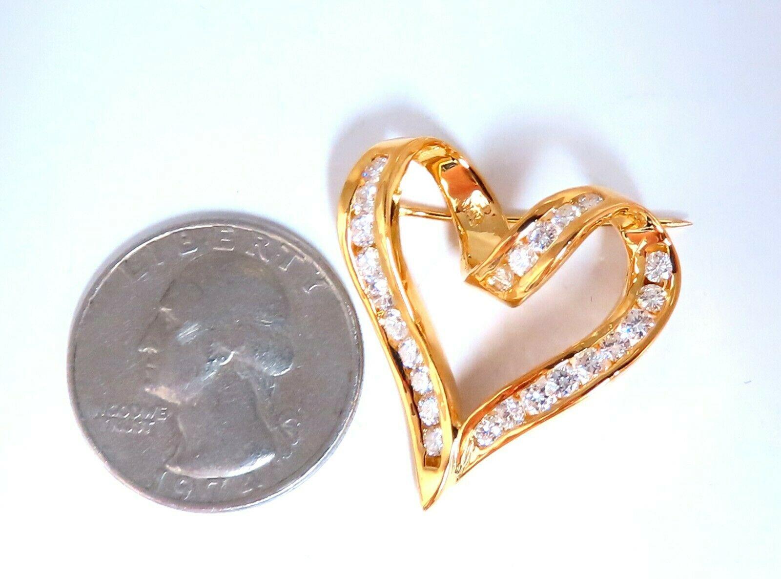 1.10ct. diamonds Heart brooch pin.

Rounds, Full cut Brilliant.

G-color Vs-1 Vs-2  clarity.

14kt yellow gold 

8.6 grams.

Overall: 1.1 X 1 inch

Excellent made 

Gorgeous Details

$5,500 Appraisal Certificate to accompany.