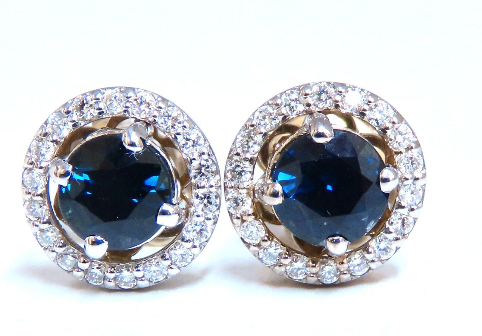 Circular Halo cluster Sapphire earrings.

1.10 carat natural round blue sapphires.

5 mm diameter.

. 40ct. Natural round diamonds

G color vs to clarity

14 karat white gold

Earrings measure 8.8 mm diameter

3.3 g