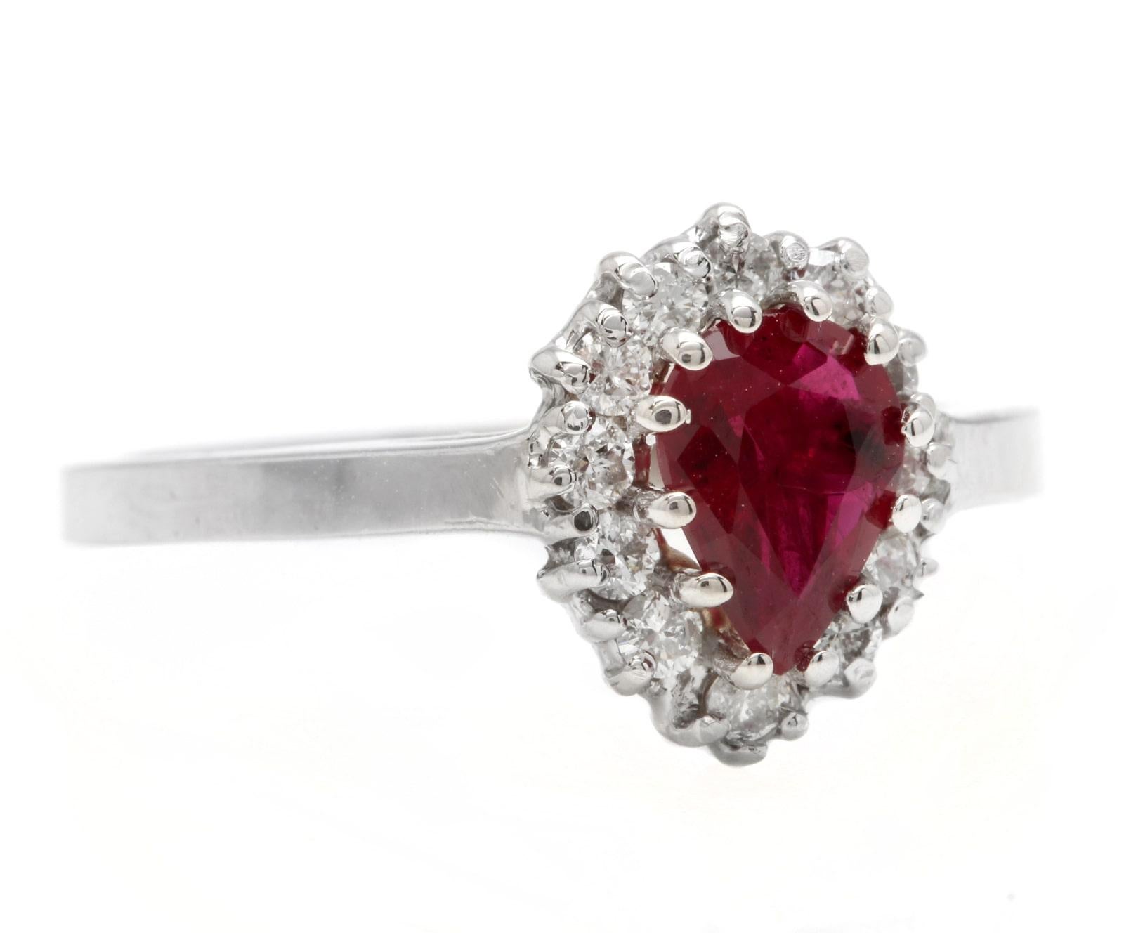 1.10Ct Natural Untreated Ruby and Natural Diamond 14K White Gold Ring

Suggested Replacement Value: Approx. $2500.00

Ruby Treatment: Untreated 

Total Pear Ruby Weight is: Approx. 0.80ct

Ruby Measures: 7 x 5mm

Natural Round Diamonds Weight: