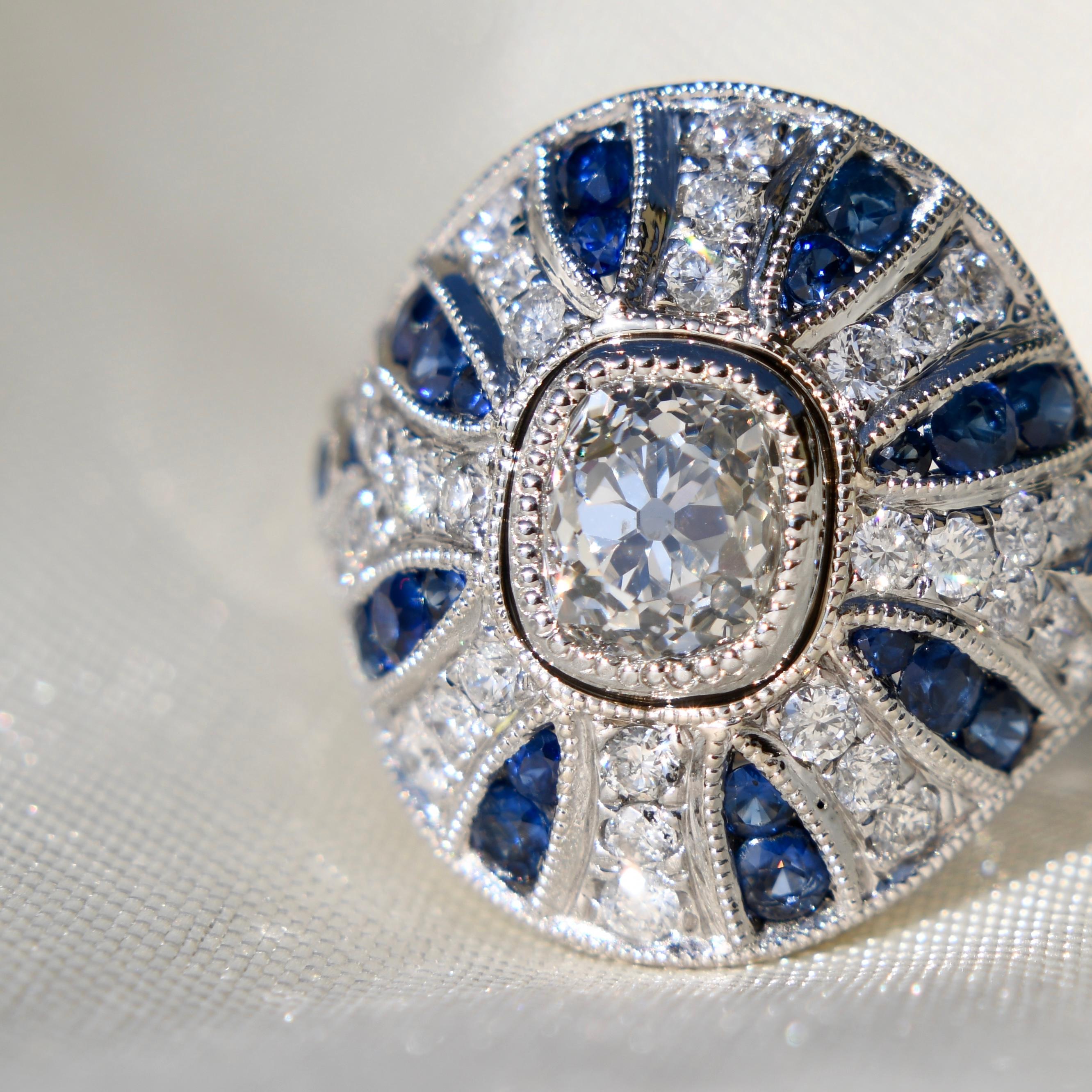 Art Deco 1.10ct old mine cut diamond and sapphire Bombé ring For Sale