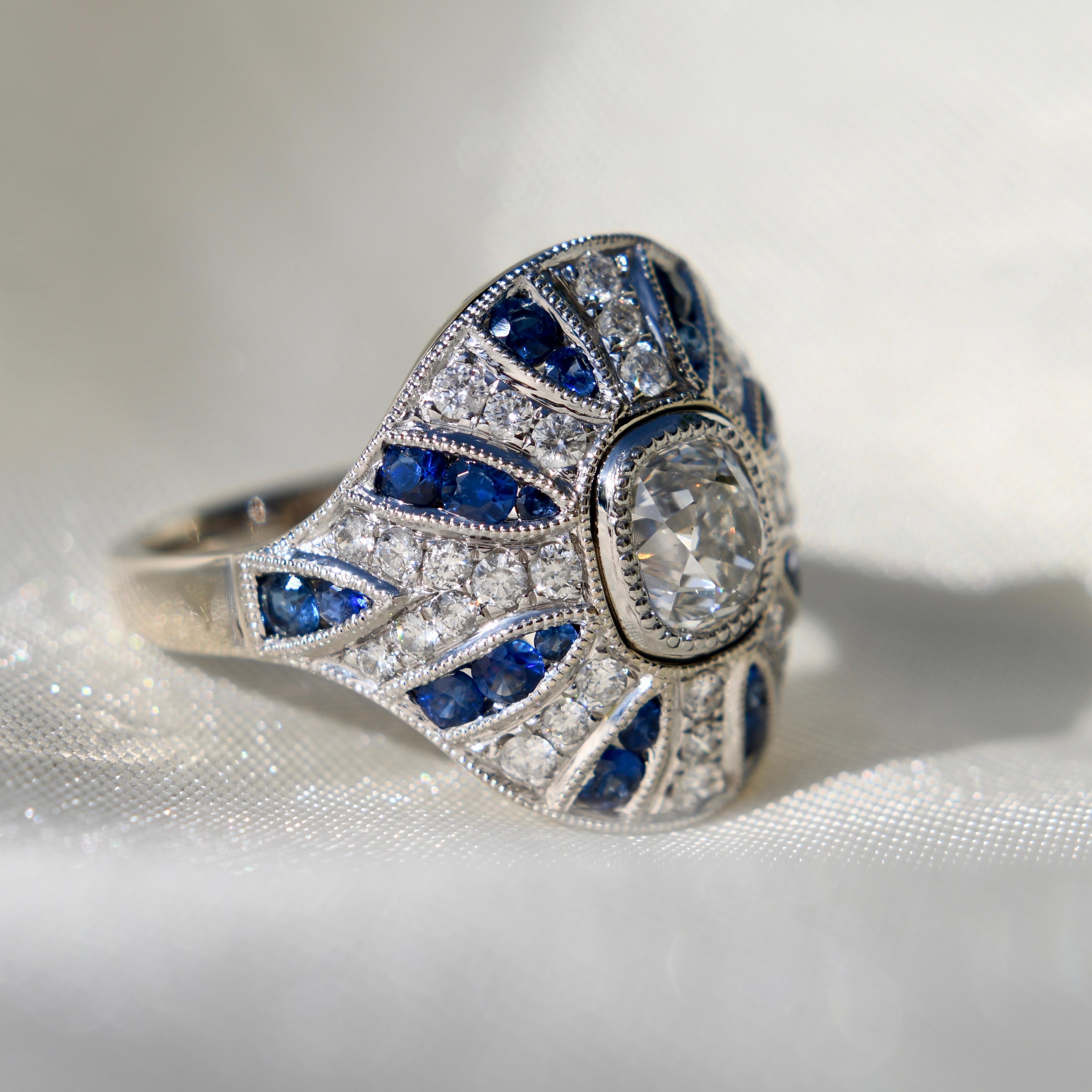 Old Mine Cut 1.10ct old mine cut diamond and sapphire Bombé ring For Sale
