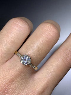 1.10ct Round old cut diamond antique engagement ring in 18k yellow gold.