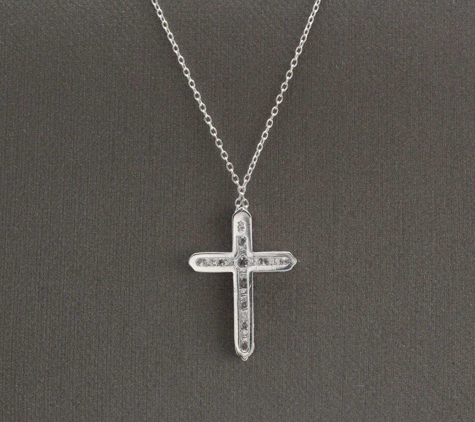 1.10Ct Stunning 14K Solid White Gold Diamond Cross Pendant Necklace

Amazing looking piece! 

Stamped: 14k

Total Natural Round Diamond Weight is: Approx. 1.10 Carats (G-H / SI)

Chain Length is: 18 inches (can adjusted to 16