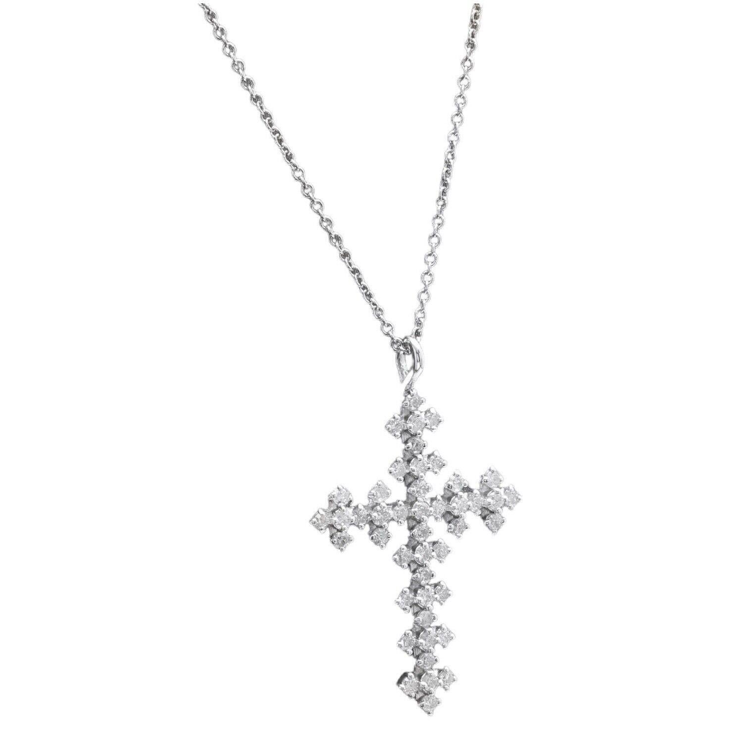 0.65Ct Natural Diamond Cross Necklace in 14K Solid White Gold

Amazing looking piece! 

Stamped: 14k

Total Natural Diamond Weight is: Approx. 0.65 Carats ( G-H / SI)

Pendant Measures: 30.80 x 19.50mm

Chain Length is: 18 inches

Total item weight