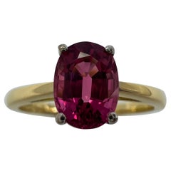Anillo solitario de oro de 18k con turmalina rubelita de color rosa vivo y púrpura de 1,10 ct y corte ovalado