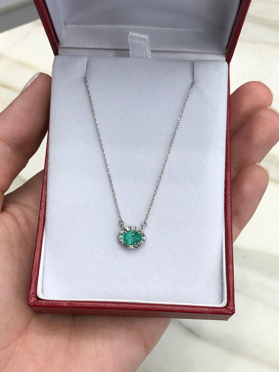 Oval Cut 1.10tcw Natural Oval Emerald & Diamond Halo Pendant in 14k White Gold East For Sale