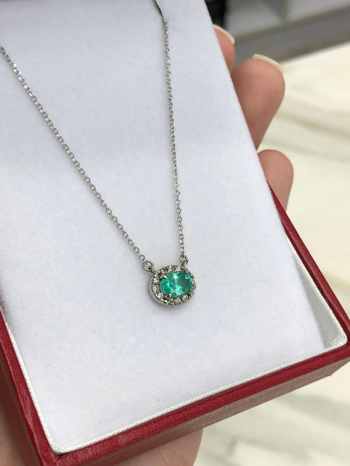 Women's 1.10tcw Natural Oval Emerald & Diamond Halo Pendant in 14k White Gold East For Sale