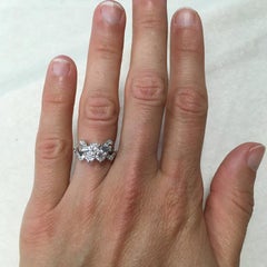 1.11 Carat Art Deco Platinum Round, Baguette and Single Cut Diamond Ring