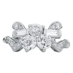 1.11 Carat Art Deco Platinum Round, Baguette and Single Cut Diamond Ring